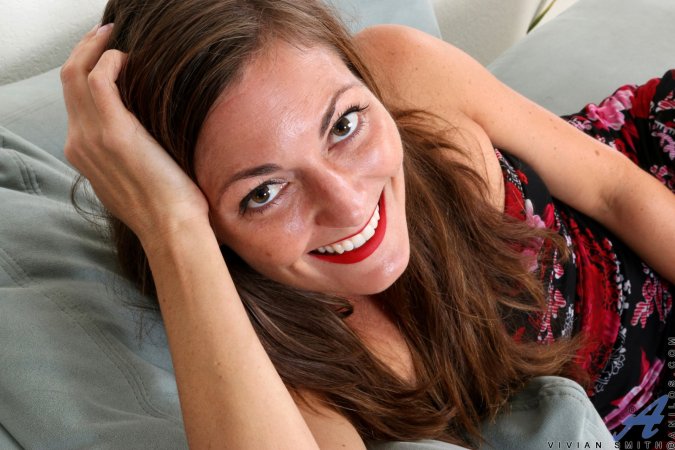 Stunning Vivian Smith undresses to stuff cunt with toy photo 6